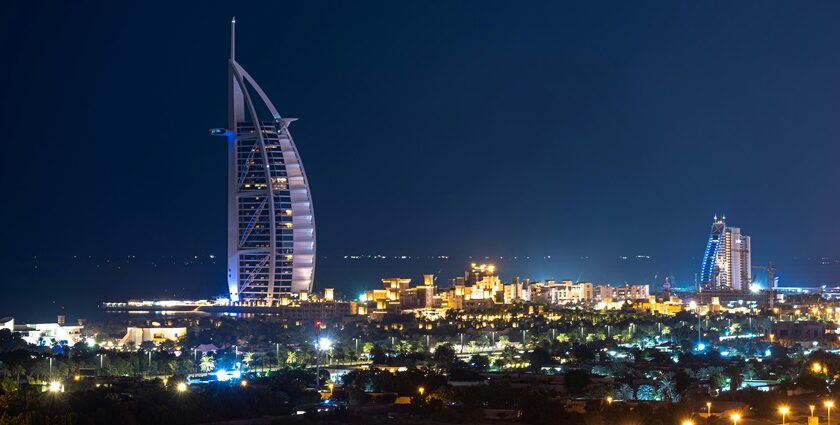 A picture of Dubai's beautiful skyline during nighttime with lights blinking from buildings