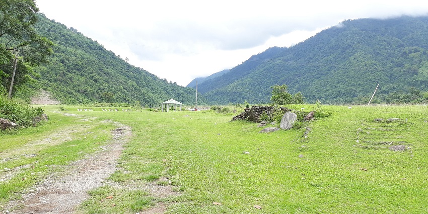 Dudhia in Darjeeling with flowing river, stony banks, and lush forested surrounding