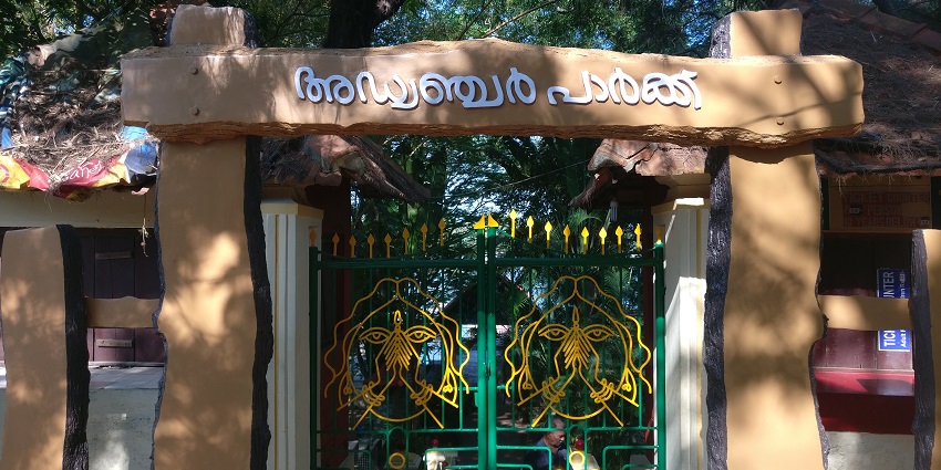 A picture of the entry gate of a water park taken from the front