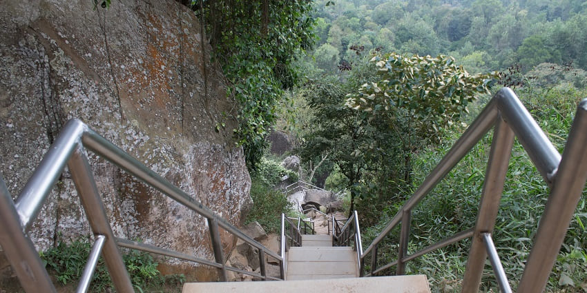 Explore the historical and significant Edakkal Caves while camping in Wayanad, Kerala.