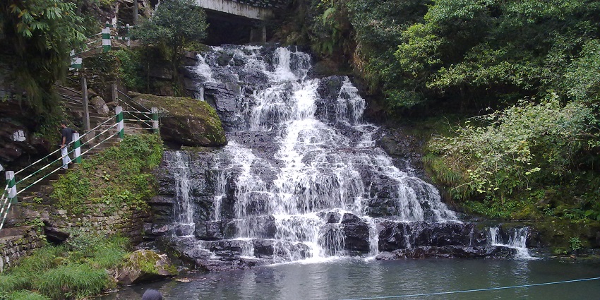 Elephant Falls offers stunning vistas and a perfect environment for relaxation amid nature.
