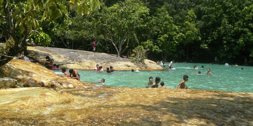 Swim in the cool waters of the emerald pool in Krabi that is surrounded by natural beauty