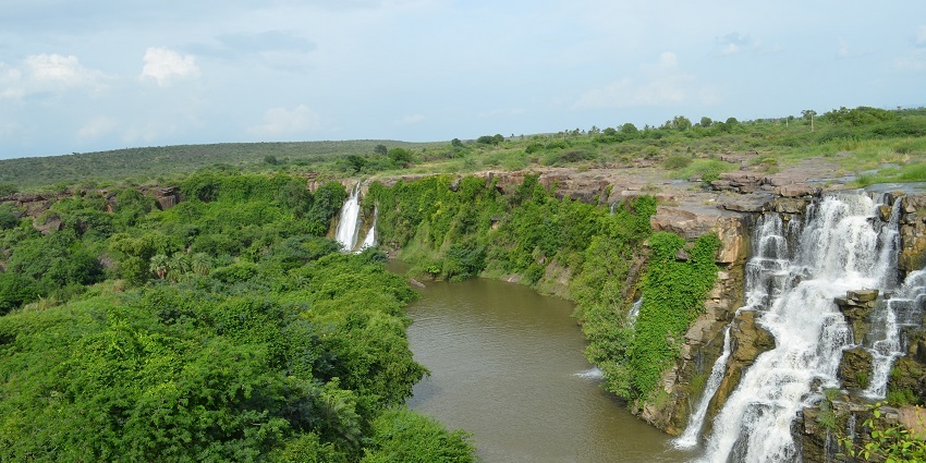 This waterfall is nestled amidst nature's lap, an add on to its magnificent charm