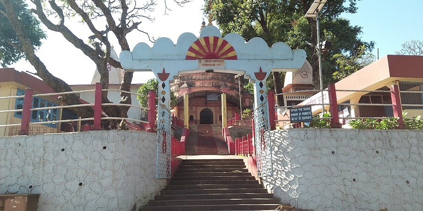 Entrance of Navagraha Temple featuring traditional architecture and ornate carvings.
