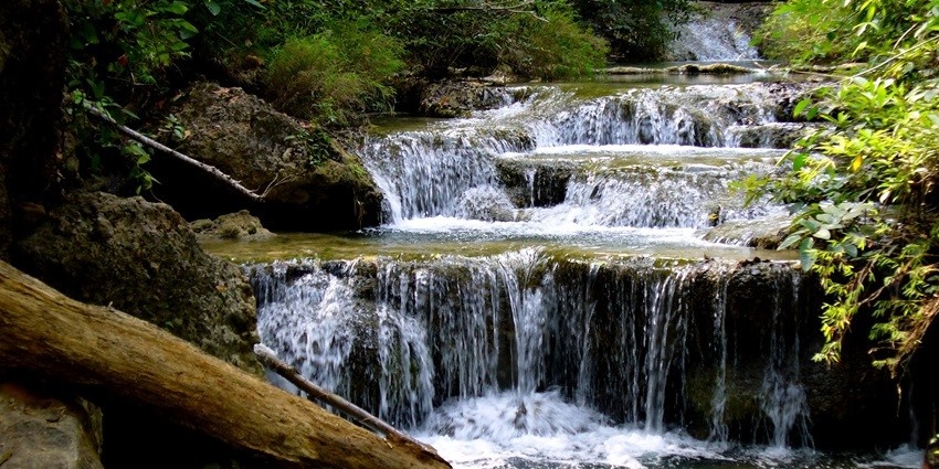 A view of the waterfalls of Erawan National Park, a must-visit hotspot in Thailand.