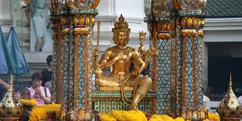 Image of the Brahma idol at the Erawan shrine, a must-visit place for families