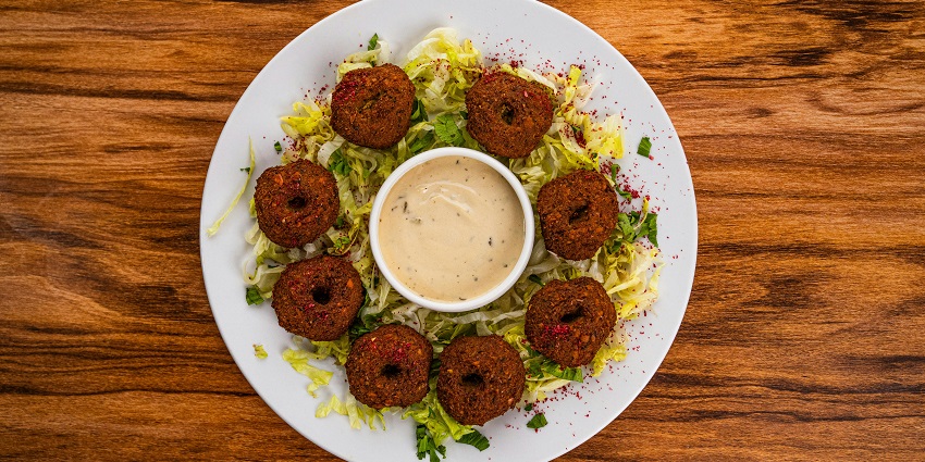 Falafel, made from ground chickpeas or fava beans, is a must-try snack for vegetarians.