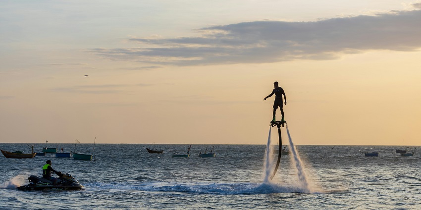 One of the best water sports in Bali with a person enjoying his time on a flyboard