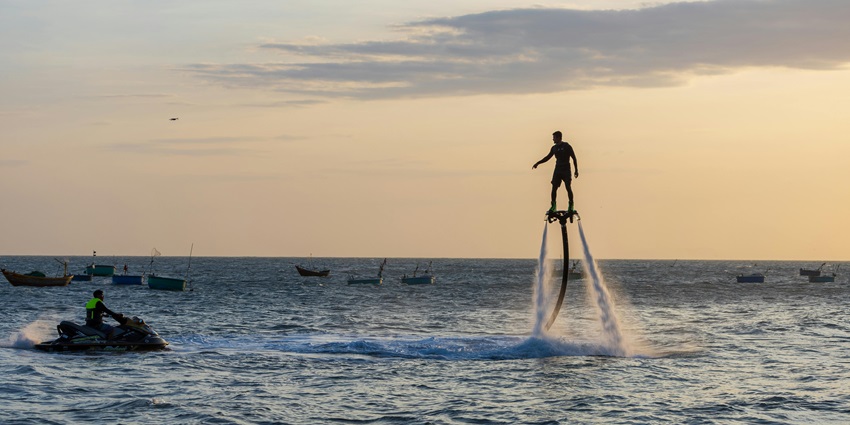 Experience a thrill with this exciting sport called flyboarding on your trip to Thailand.