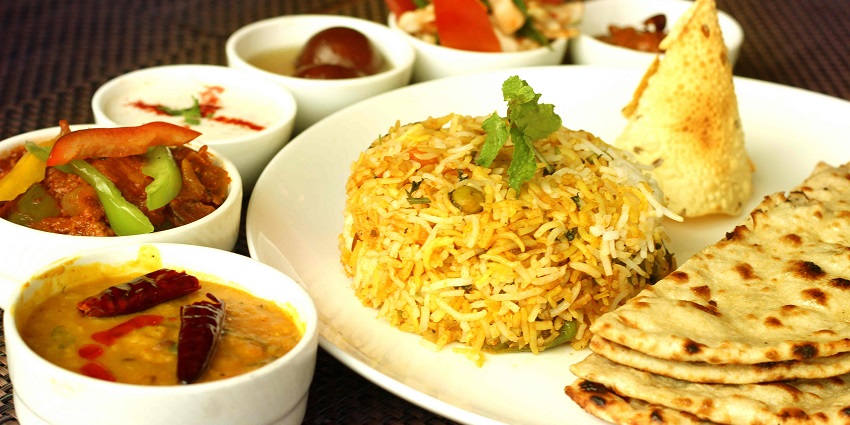 Snap of the famous Indian Veg Thali having varieties of dishes on the plate