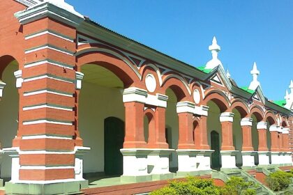 Kangla Fort Complex with ancient structures, lush greenery, and serene water bodies.