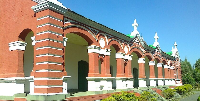 Kangla Fort Complex with ancient structures, lush greenery, and serene water bodies.