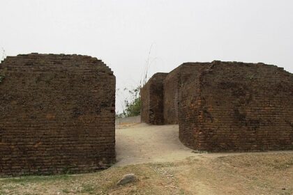 Ruins of an ancient fort with crumbling walls, and a sense of historical grandeur.