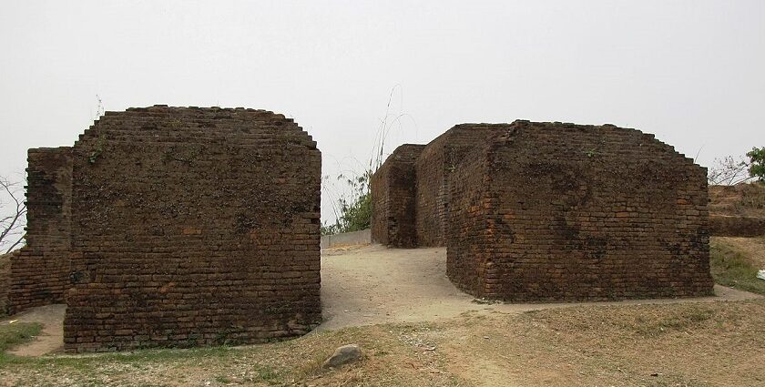 Ruins of an ancient fort with crumbling walls, and a sense of historical grandeur.