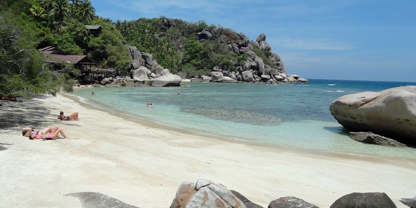 A view of people sunbathing at the pristine sands of Freedom Beach of the region.