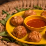 Try delicious non-veg food in Shimla like fried chicken momos on your visit here