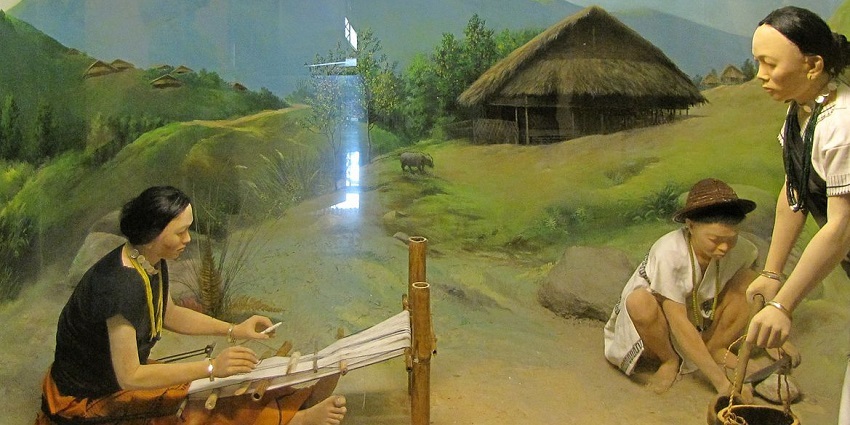 Galo tribe diorama displaying traditional attire, and daily life in detailed miniature form.