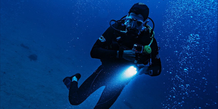 Scuba diving in Phu Quoc with divers exploring the underwater world and its marine life.