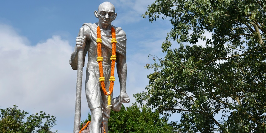 A garlanded statue of Mahatma Gandhi seen during his 150th Birth anniversary celebrations, in Guwahati.