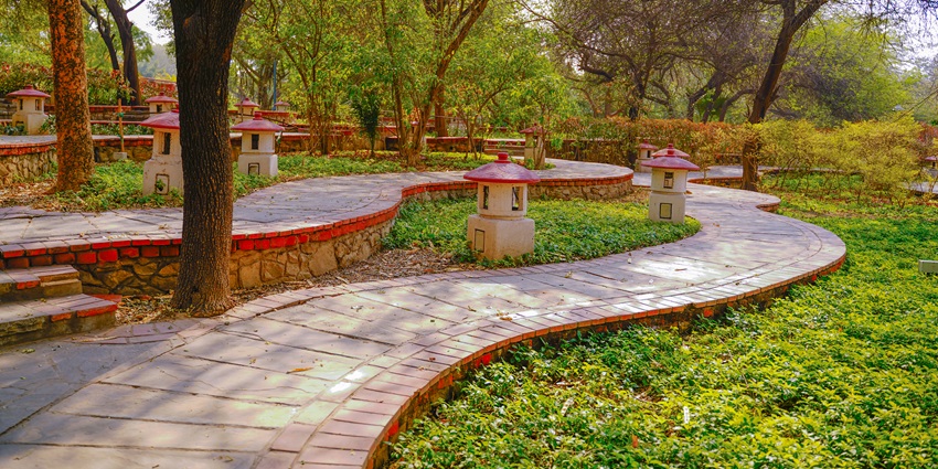 Garden Of Five Senses is a visual delight for all nature lovers with spiral pathways and sculptures of elephants