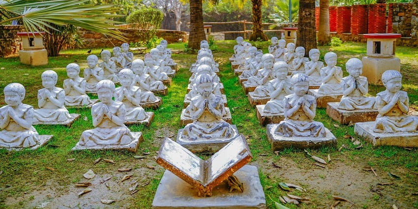 Art sculptures in the Garden of Five Senses, one of the places to visit in Delhi with family in summer