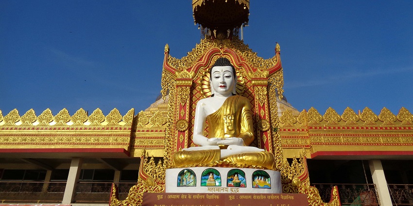 Image of Gold Gautam Buddha statue in a Pagoda - places to visit in Namsai