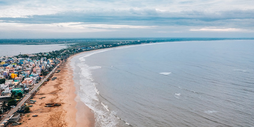 A captivating aerial view of the Ghoghla Beach with a beautiful sky in the background.