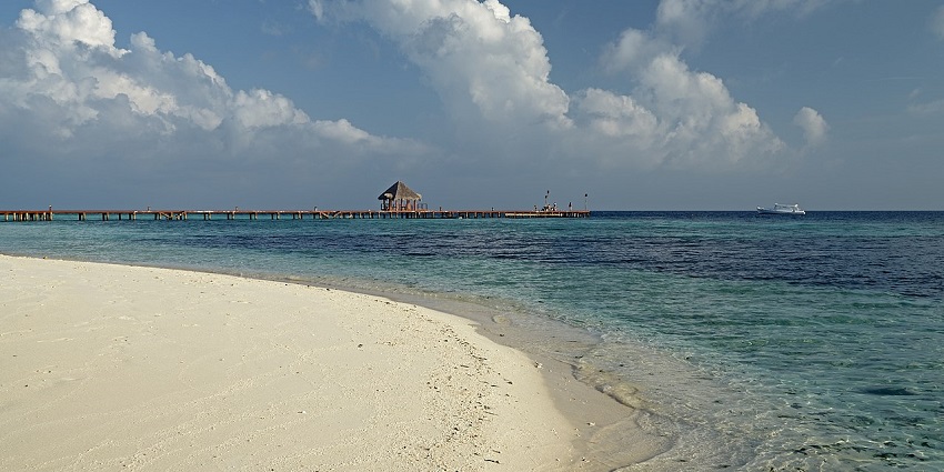 The Scenic snapshot of a beautiful sandy beach—Things to do in Maldives for Couples