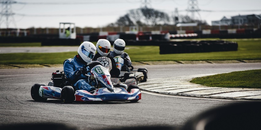 The go-kart track transforms into a pulsating dance floor with live music and DJ performances.