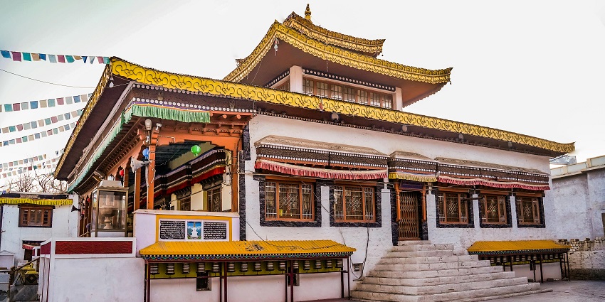Gompa featuring traditional architecture, vibrant prayer flags - places to visit in Bomdila.