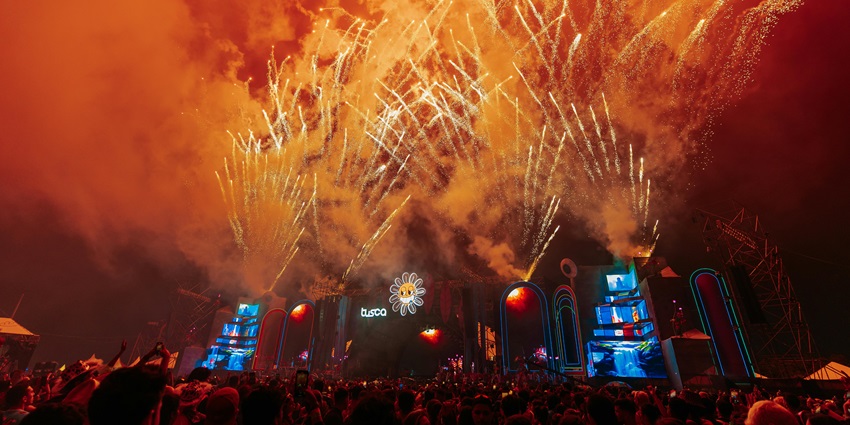 A picture of a New Year celebration at a ground during night time