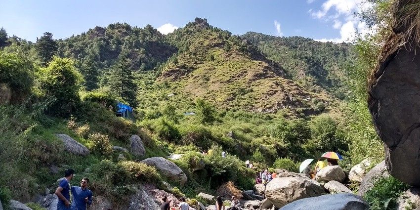 This waterfall nestled amidst picturesque trails offers the ideal in nature's embrace