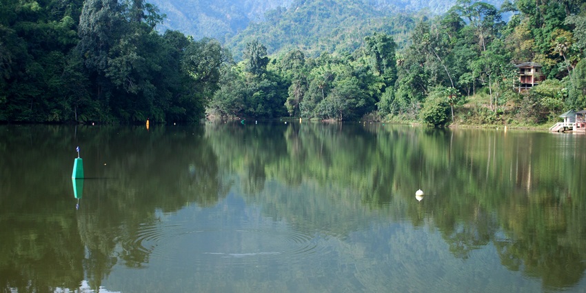 Image of Ganga Lake, with tranquil waters surrounded by lush greenery and scenic views.