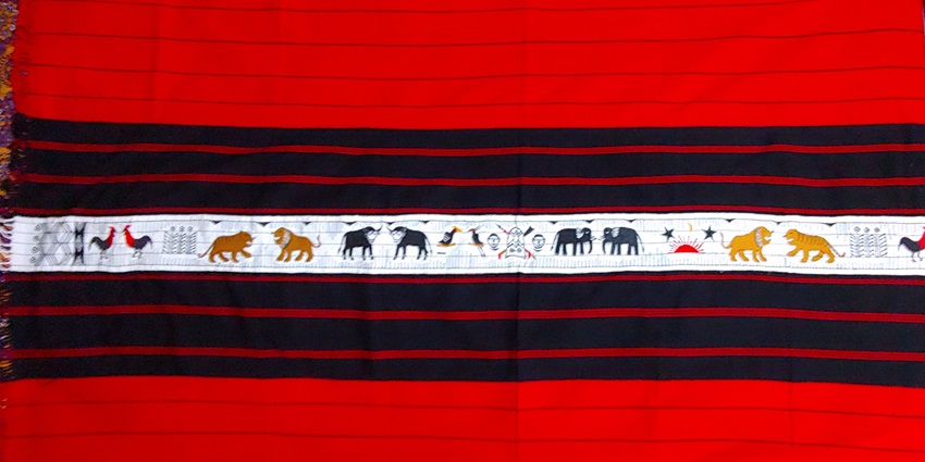 Intricately woven Naga shawl featuring traditional patterns - places to visit in Dimapur