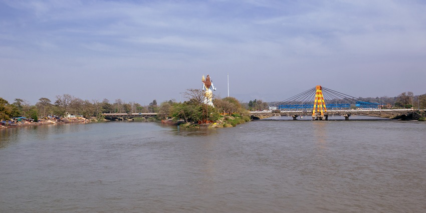 View of the Ganga River from a footbridge at Haridwar ghat—hill stations in north india