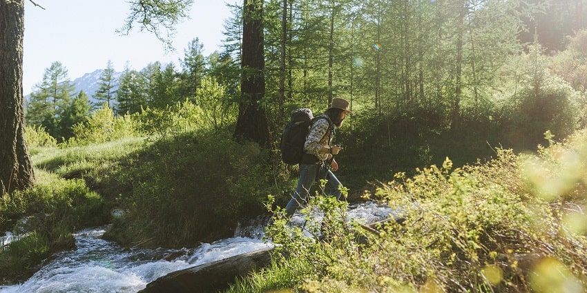 tle: Helieu River Trek
Alt Text: People hiking at Helieu River, one of the scenic spots for trekking in Arunachal Pradesh.