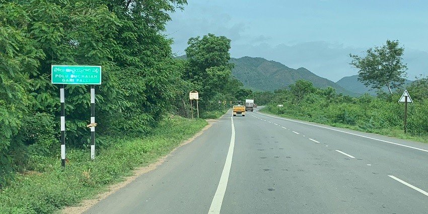 The national highway passing throught the beautiful hills and green cover near temple