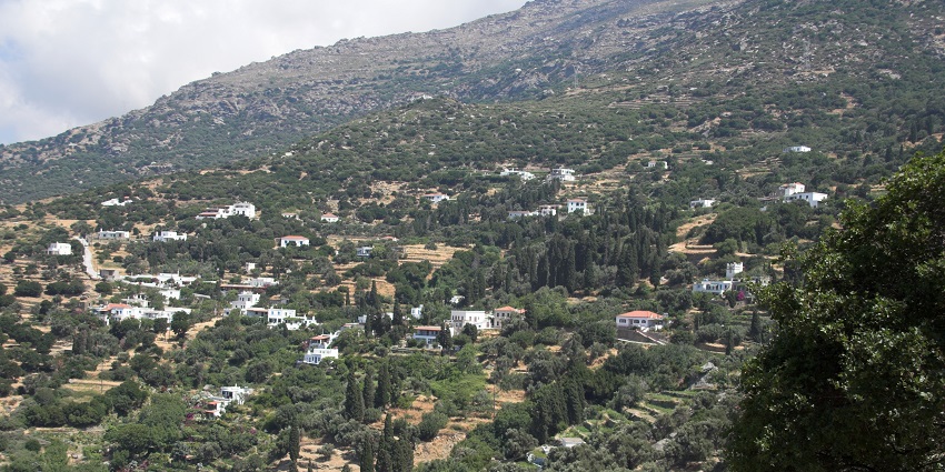 Scenic Andro Village with traditional houses, lush greenery, and cultural heritage sites.