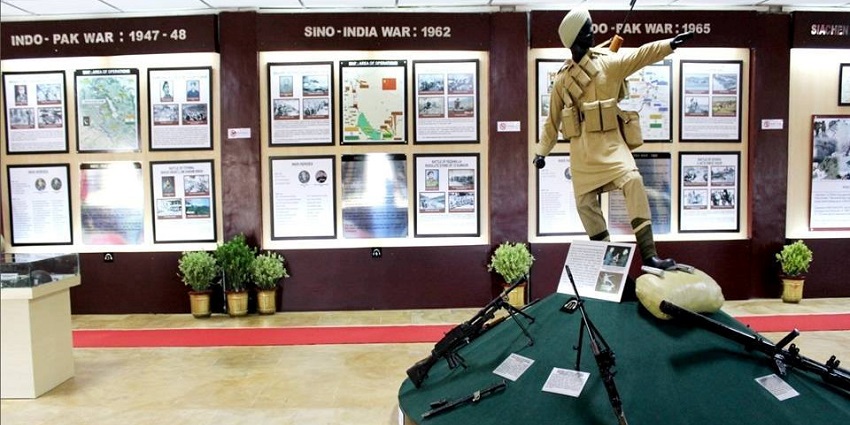 An image of weapons on display in the historic Indian Army Hall, War Museum in India.