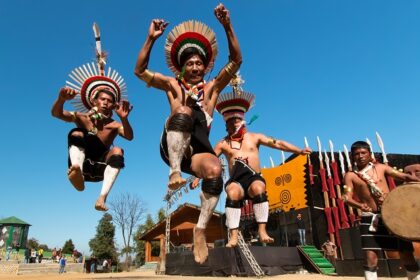 A picture of native people celebrating the Hornbill Music festival by dancing