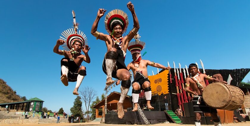 A picture of native people celebrating the Hornbill Music festival by dancing