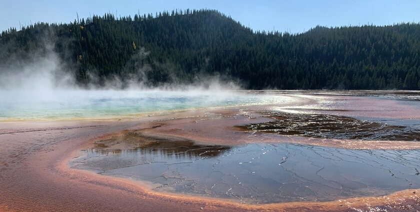 Beautiful naturally formed Manikarn hot spring near the historic temple of Manikarn