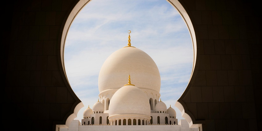 Plan a trip to Abu Dhabi, United Emirates, and explore the city either by car or by taxi.