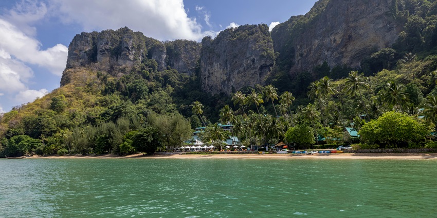 You can either take a boat or car to reach the Krabi Railay Beach, located in Thailand.