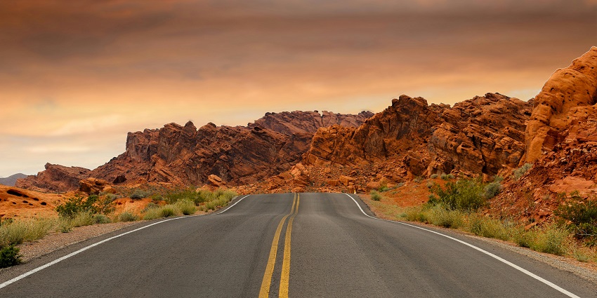 Evening snapshot of a road passing through the tranquil and beautiful landscapes