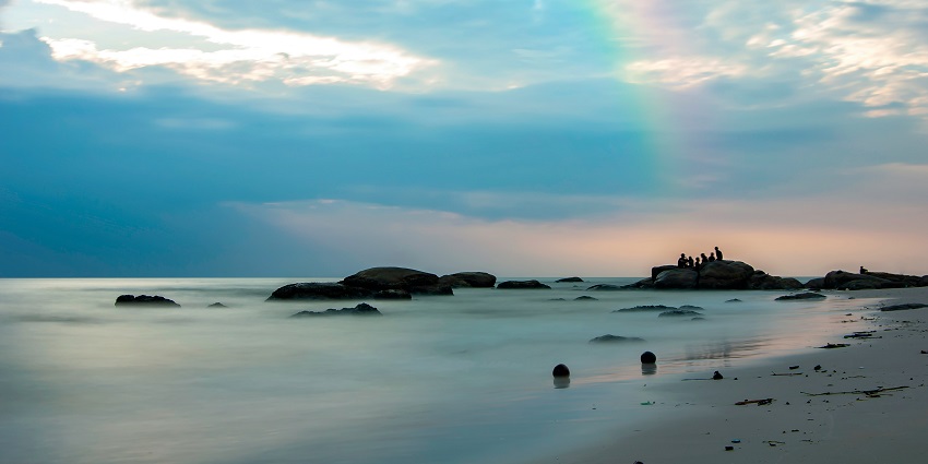 A breathtaking vista of pristine sandy beaches meeting the azure waters in Hua Hin.