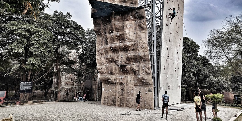 A wall climbing challenge, which is one of the best things to do in Delhi in summer