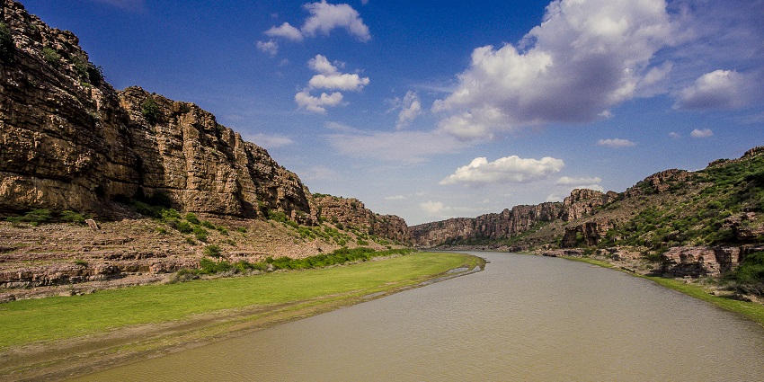 The Indian Grand Canyon features colourful cliffs and a serene landscape - Gandikota Canyon.