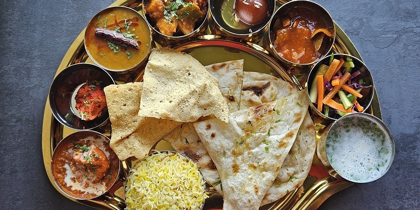Try the local Indian thali in Himachal Pradesh during this trip for a great experience.