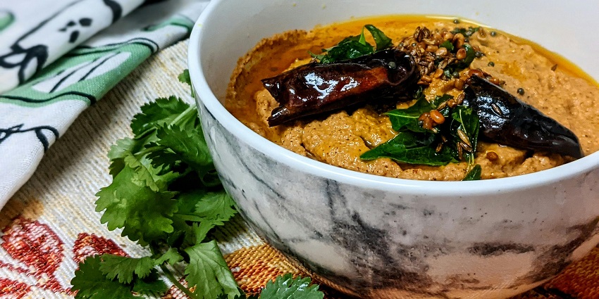 Delicious cooked food served in a white ceramic bowl, ready to enjoy.